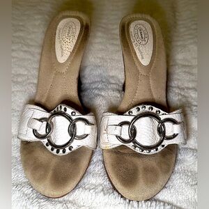 Gently worn Dr. Scholl’s Jubilee slide, buckle, and wooden wedge. Size 6.